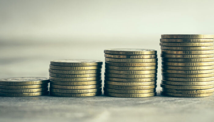 Stack of coins representing increasing profit margins