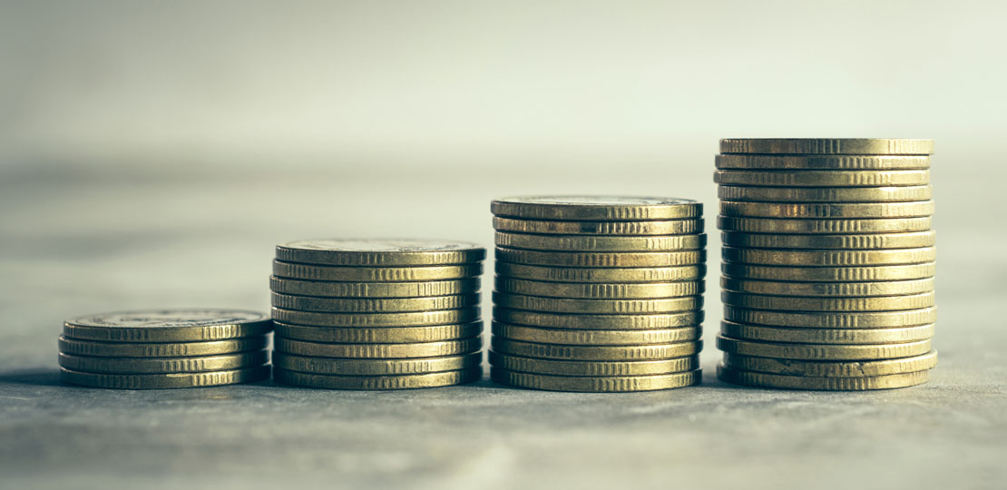 Stack of coins representing increasing profit margins