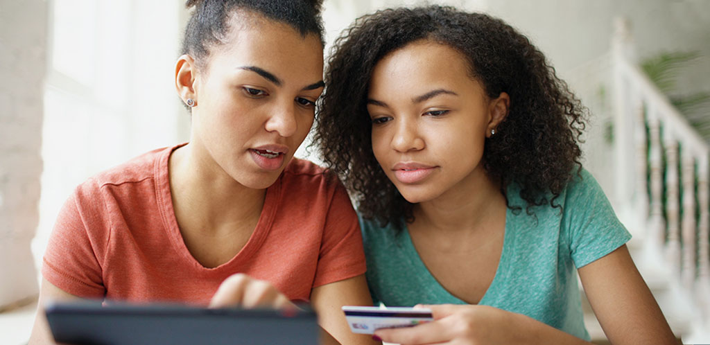 Two young women shopping at pure play retailers