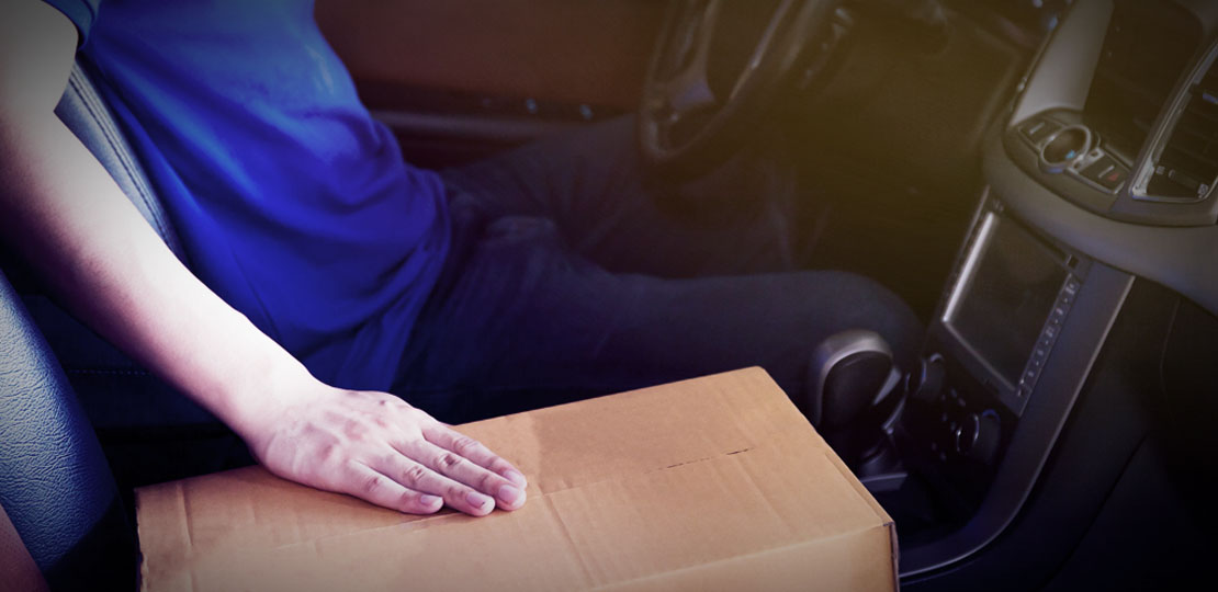 Retail worker delivering a package